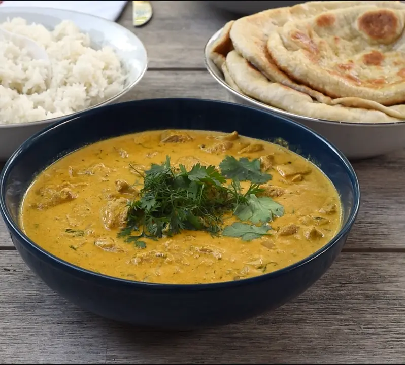 Homemade Chicken Korma with rice and naan bread